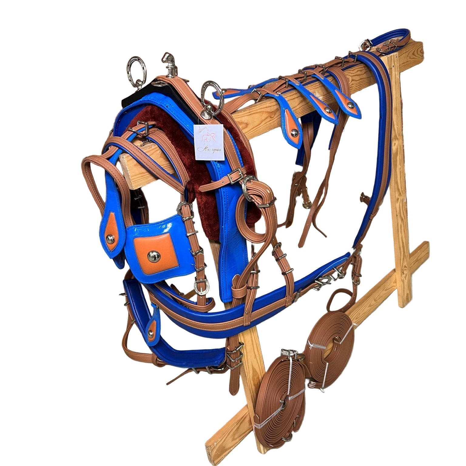 A brown and blue breeching harness for ponies horses and shetland