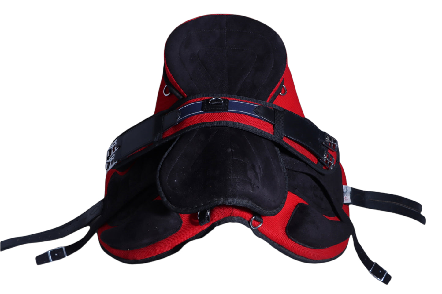 A red and black treeless saddle made of synthetic freemax material, featuring a detachable seat, velcro system, wither iron arch, stirrups straps, and E bars.