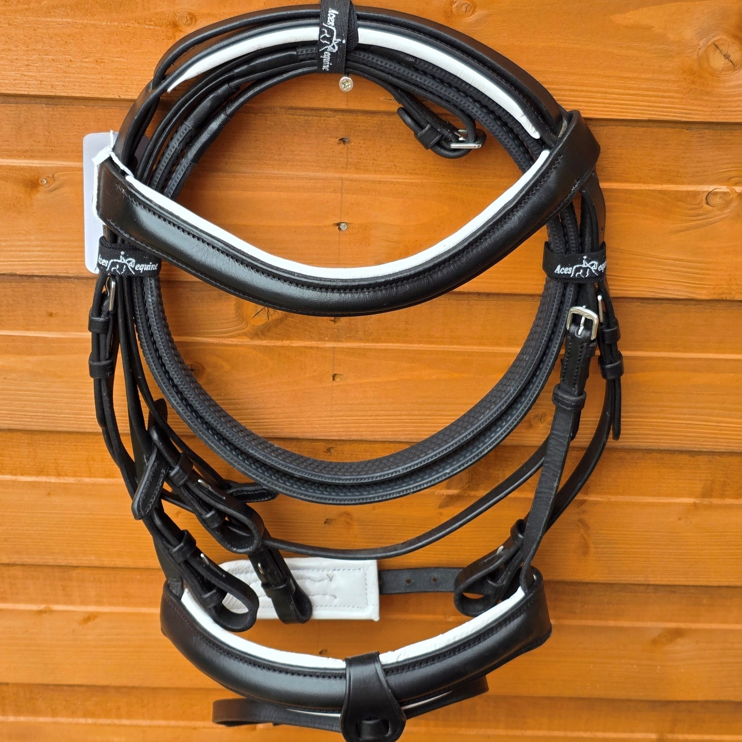 PremiumComfortHorseBridleBlackAndWhitePadded1.5InchNosebandwithRubberGripReinsandDetachableFlash1